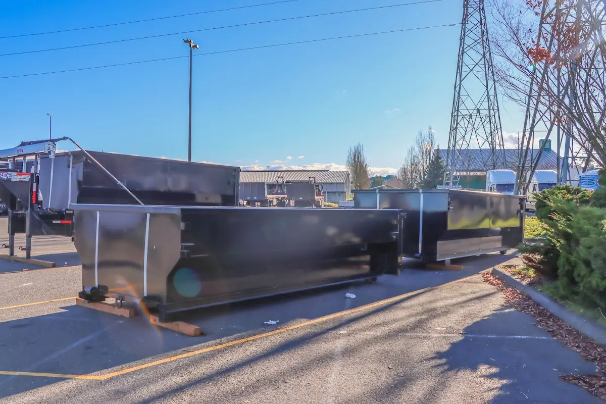 Roll-off dumpster ready for waste disposal at job site for Roofing Dumpster Rental in Andover